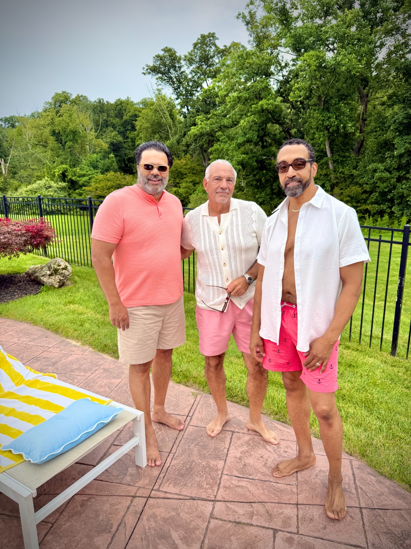 Sunil with cast members outdoors