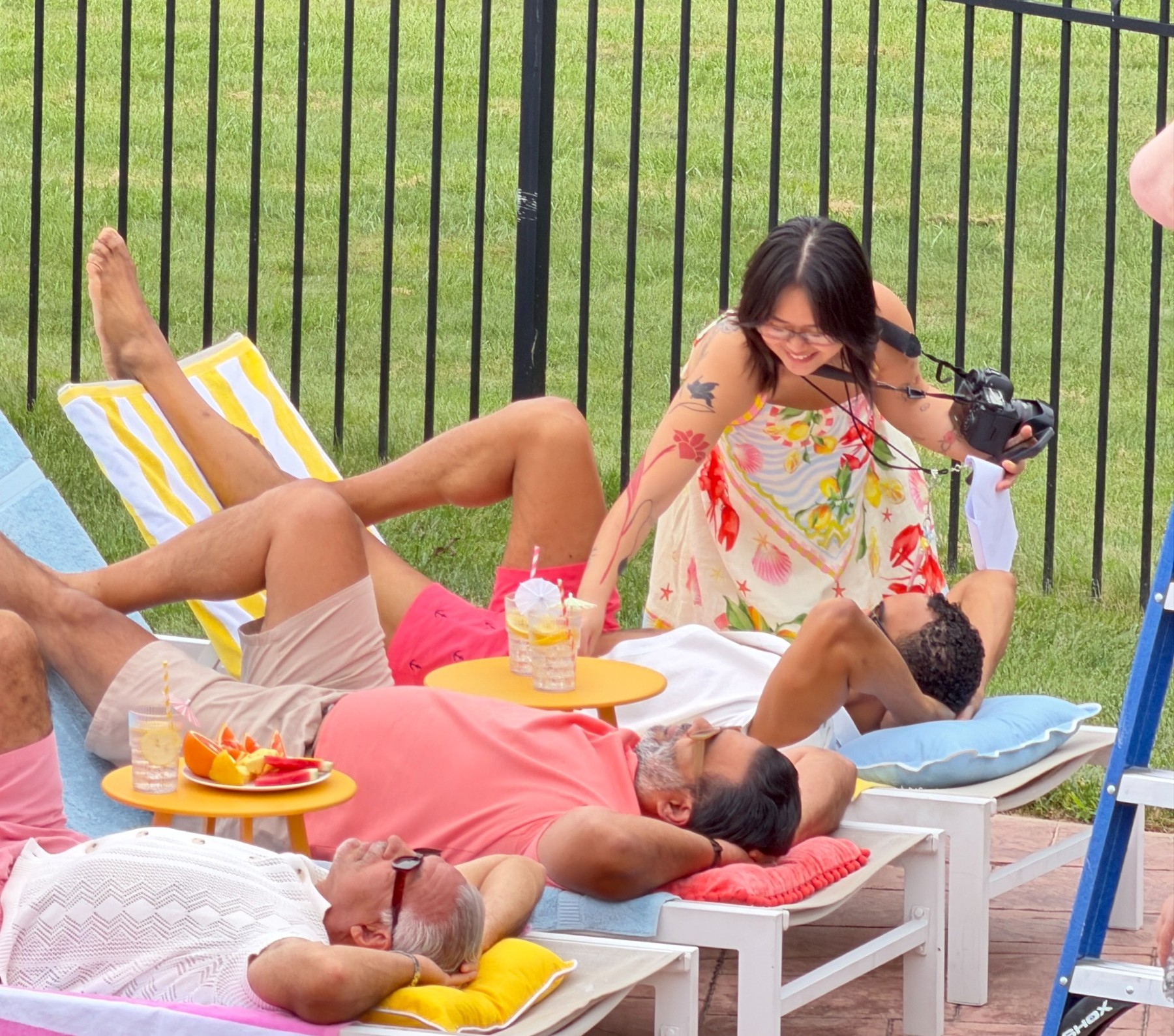 Sunil filming an outdoor table scene