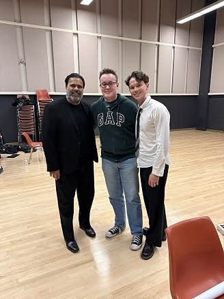Sunil with fellow performers at rehearsal