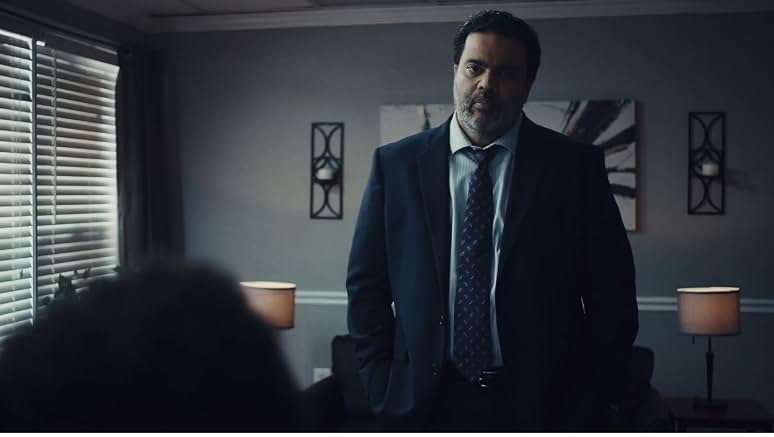 Sunil in a dramatic office scene