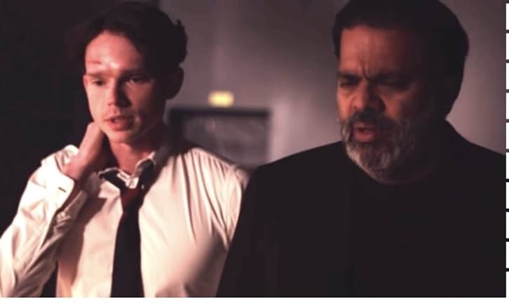 Sunil in a scene with another performer