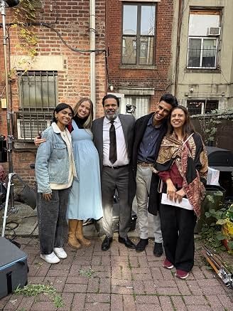 Sunil with cast members on location