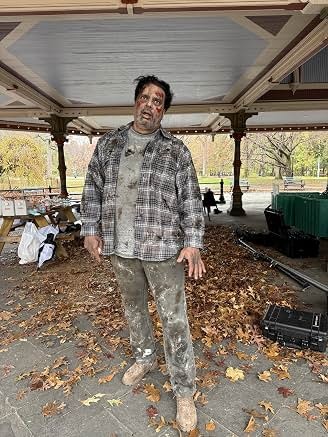 Sunil in costume at an outdoor location