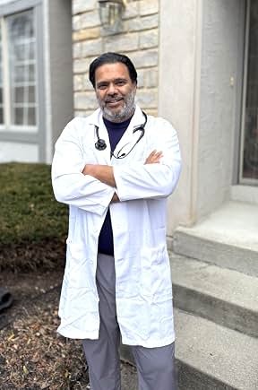 Sunil as a physician in a white coat