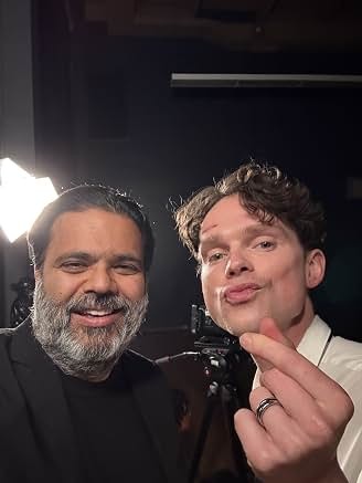 Sunil and a fellow performer behind the scenes