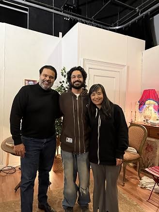 Sunil with cast members at an event