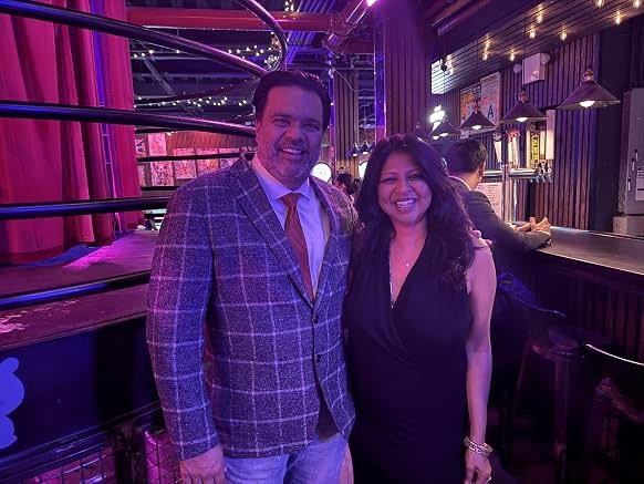 Sunil with a fellow performer at an evening event