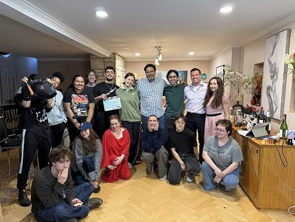 Cast and crew gathered on set