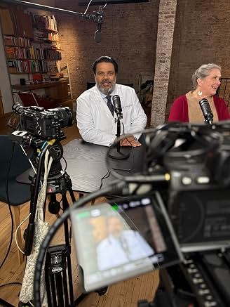 Sunil and cast filming a table scene