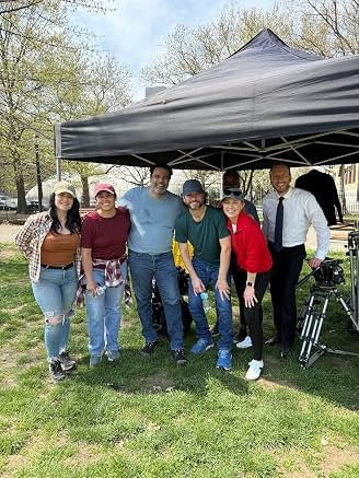 Sunil with cast and crew outdoors